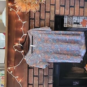 Women's LuaRoe shirt orange  blue and white flowered design. Size Xl